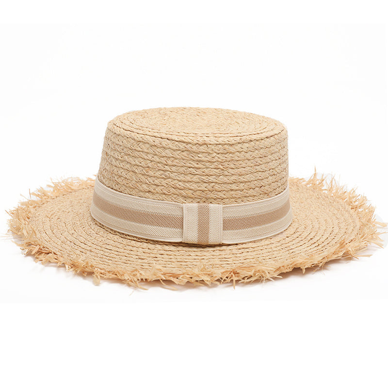 Women's boater straw hat with frayed edging and nude ribbon detail