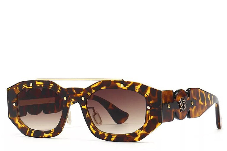 Women's tortoise and gold sunglasses