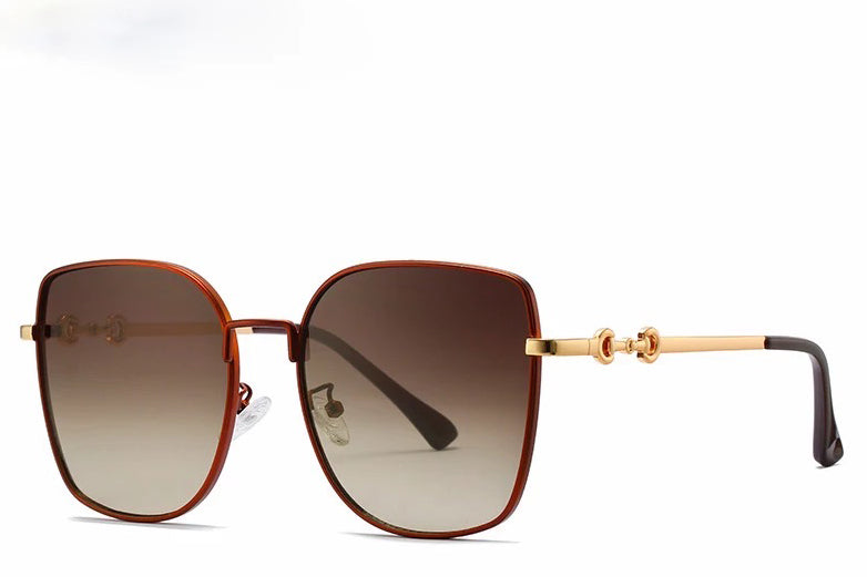 Women's brown oversized cat eye sunglasses