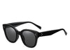 Women's black frame round sunglasses