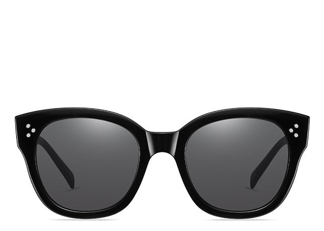 Women's black frame round sunglasses