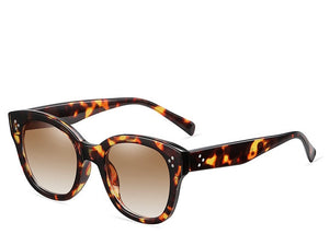 Women's brown frame round sunglasses