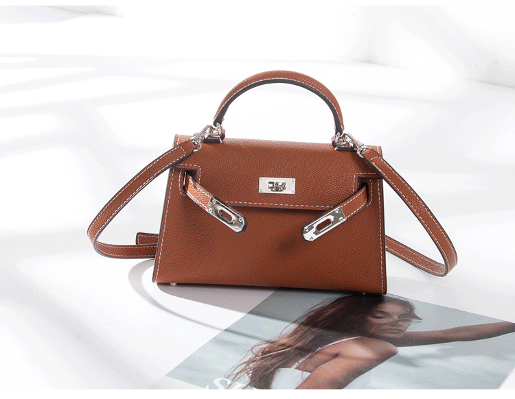 Women's tan vegan faux leather mini handbag with silver hardware