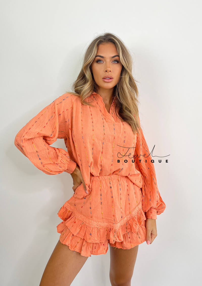 Women's orange linen top and shorts set